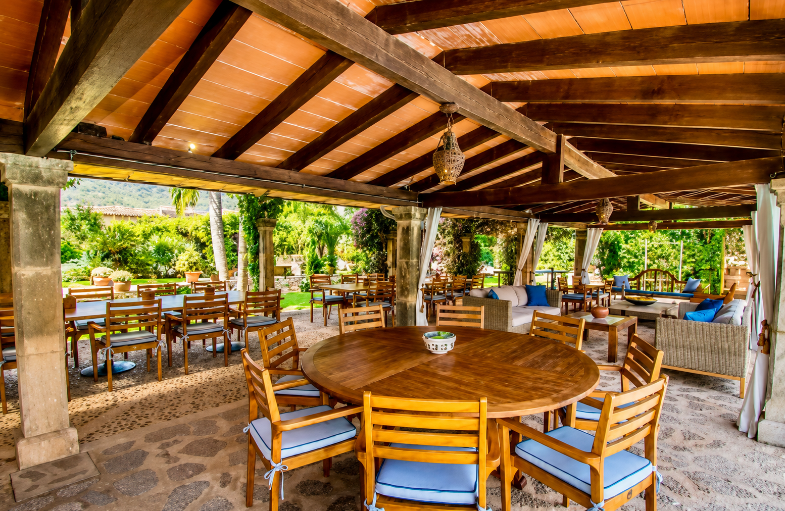 A calm Mediterranean finca terrace at golden hour.